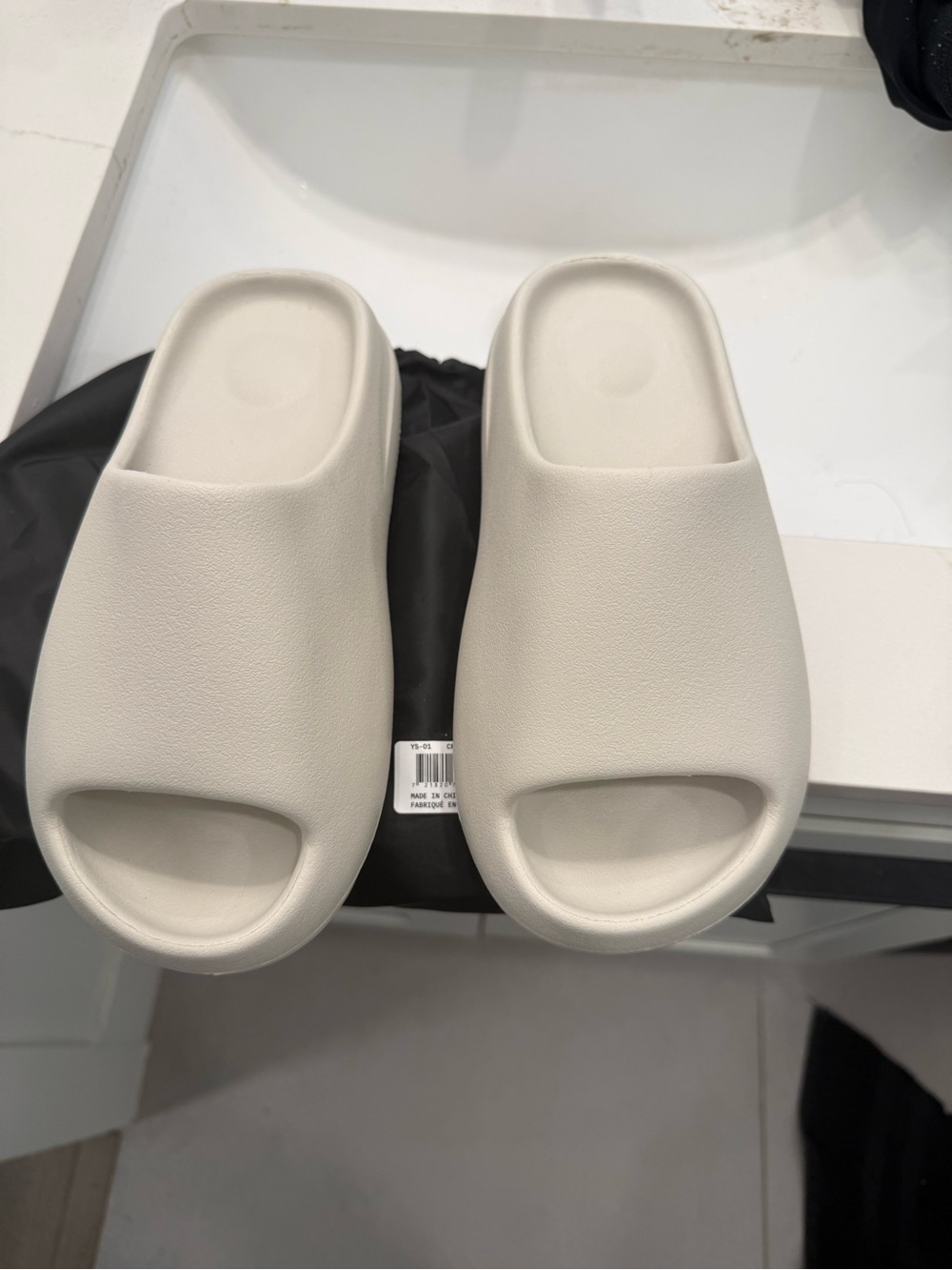 Yeezy Slide Sandals in Off-White/Cream